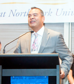 Modesto Tico Valle accepts the Alford-Axelson Award, which was presented to the Center on Halsted in 2012 at the annual Axelson Symposium in Chicago.