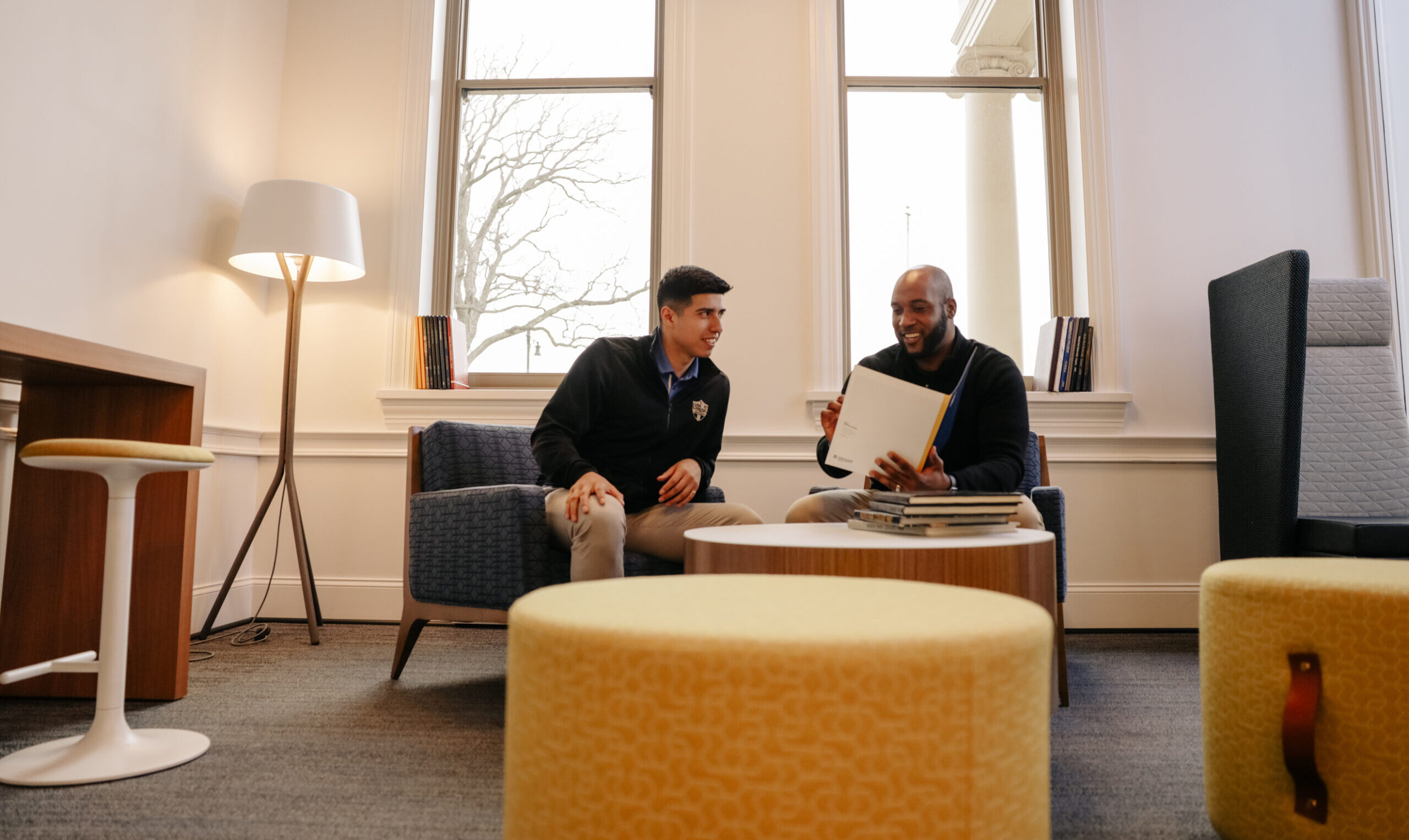 A prospective student talks to an undergraduate admissions counselor.