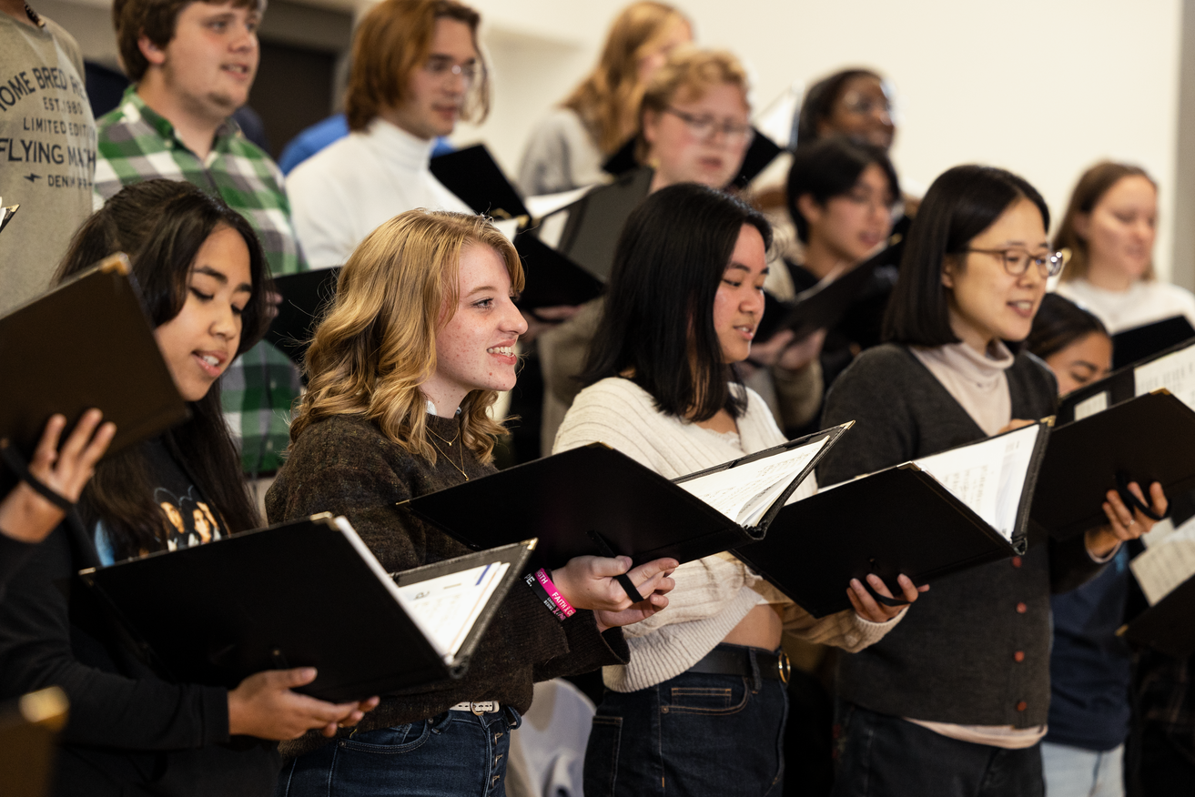 Students singing in choir.