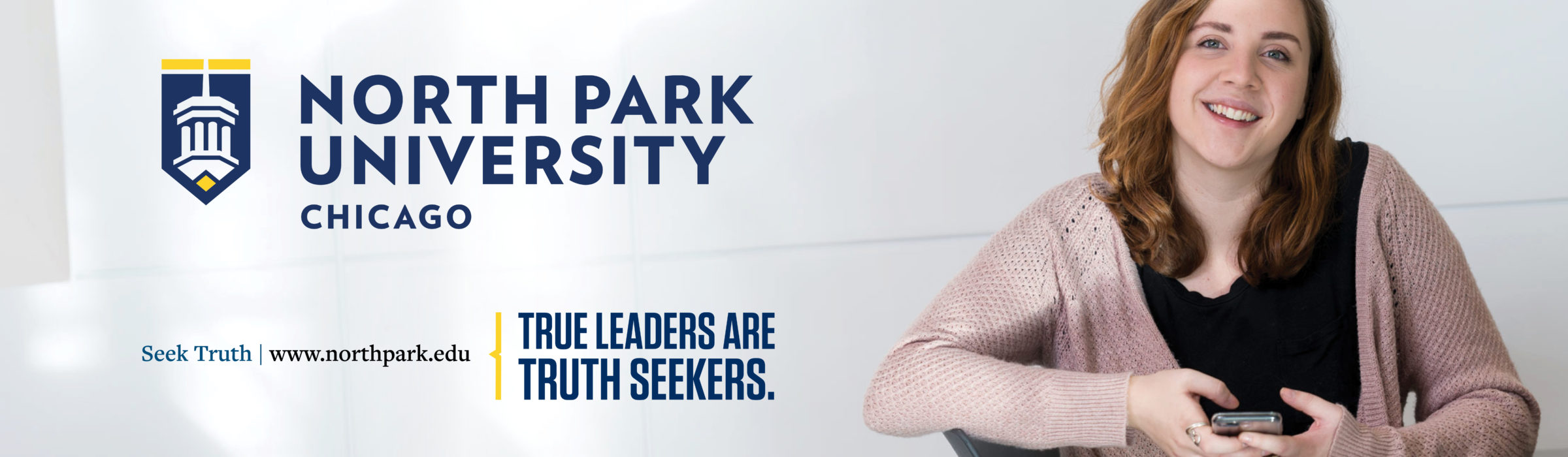 "True Leaders are Truth Seekers." billboard ad with female student