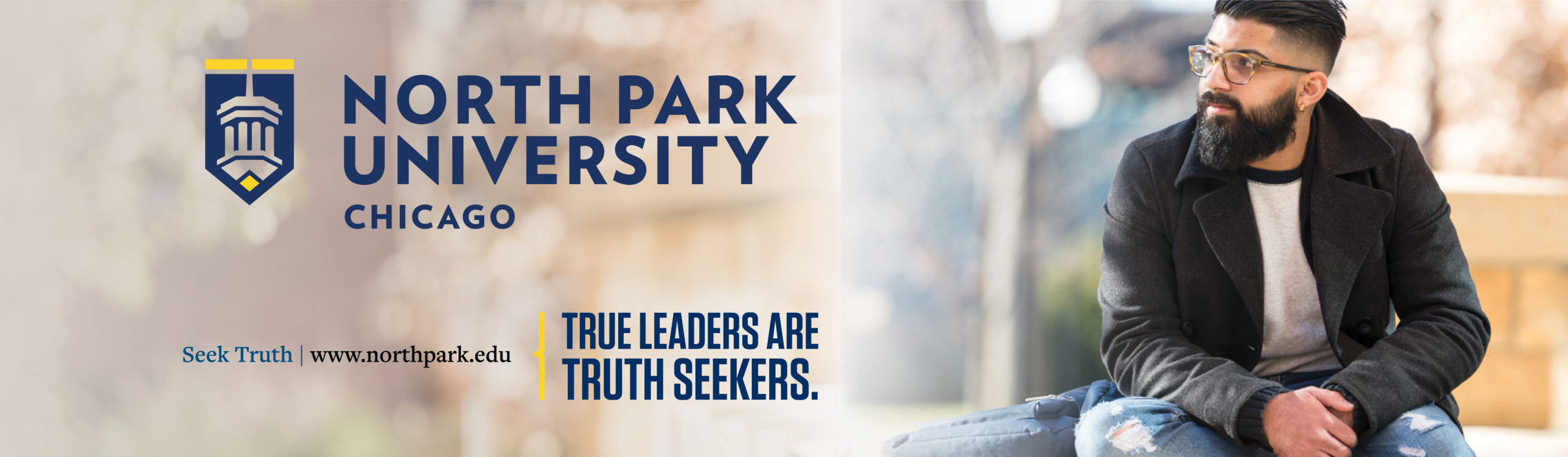 "True Leaders Are Truth Seekers." billboard ad with male student. 